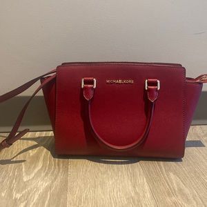 Red medium sized Michael Kors Purse